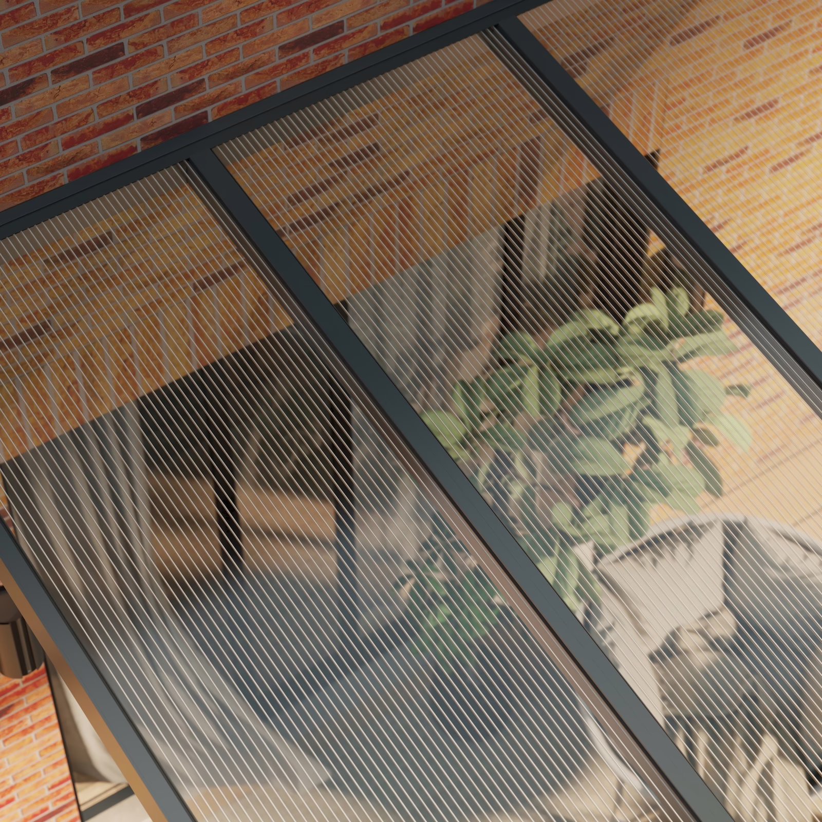 Terrasoverkapping met helder polycarbonaat dak en antraciet frame