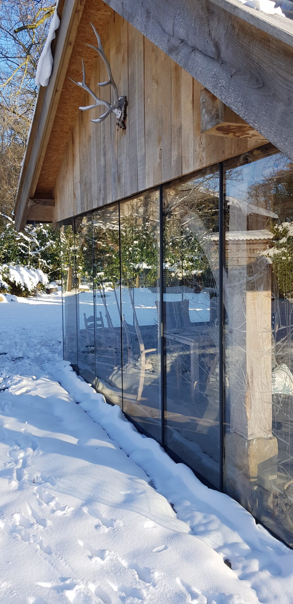 overkapping sneeuwvrij maken